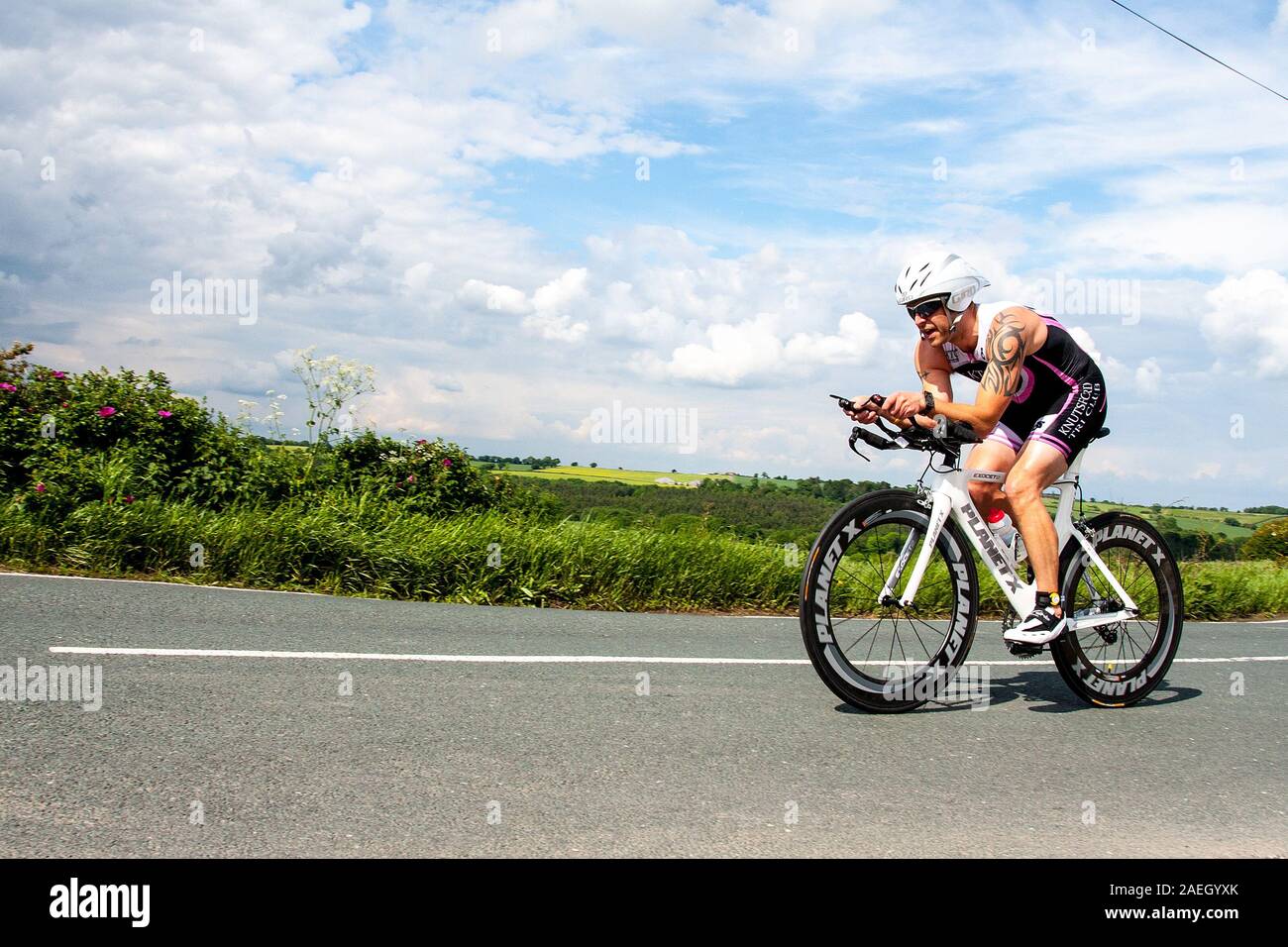 triathlete during cycle leg of a triathlon Stock Photo Alamy