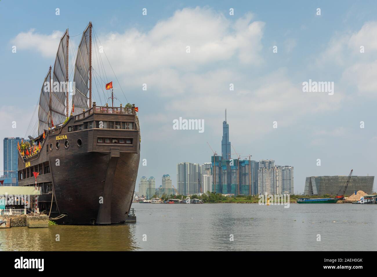 Ho Chi Minh City / Vietnam - March 03 2019: The ship 'Elisa', a floating restaurant (in shape of an Asian sailing ship) in the Saigon river.  G Stock Photo