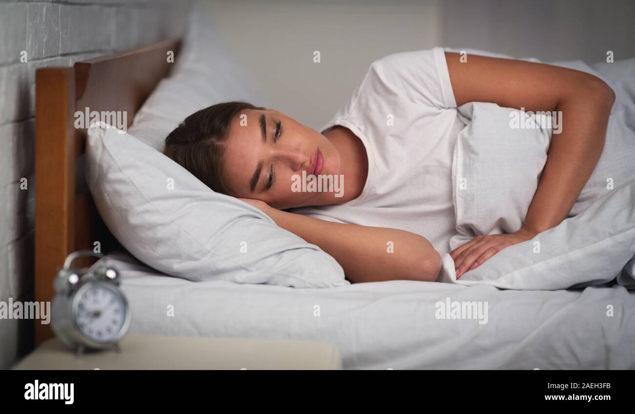 Girl Lying In Bed Suffering From Sleep Disorder At Home Stock Photo Alamy