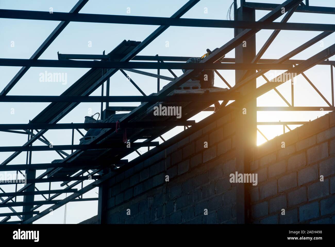 The roof construction and lightweight brick wall construction Stock Photo