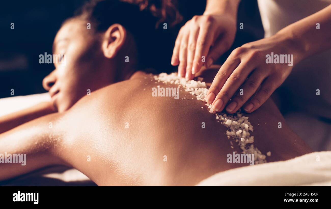 African-american woman having exfoliation treatment in spa Stock Photo