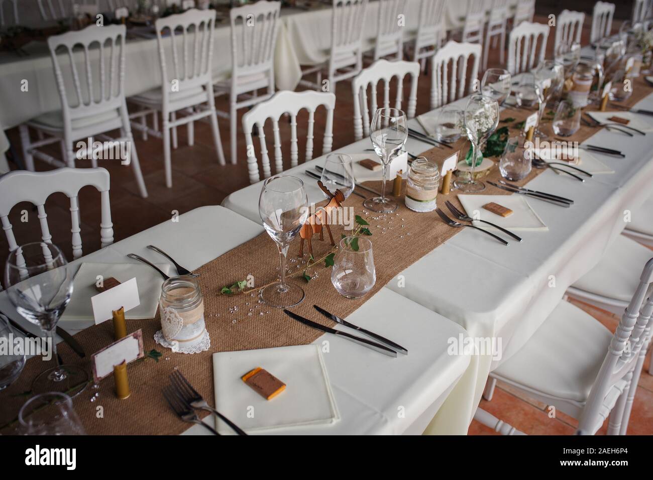 Outdoor Catering Dinner At The Wedding With Homemade Garnishes Decoration.  Rustic And Boho Style Decor, Natural Materials, Figures Of Deer, Green And  Stock Photo - Alamy