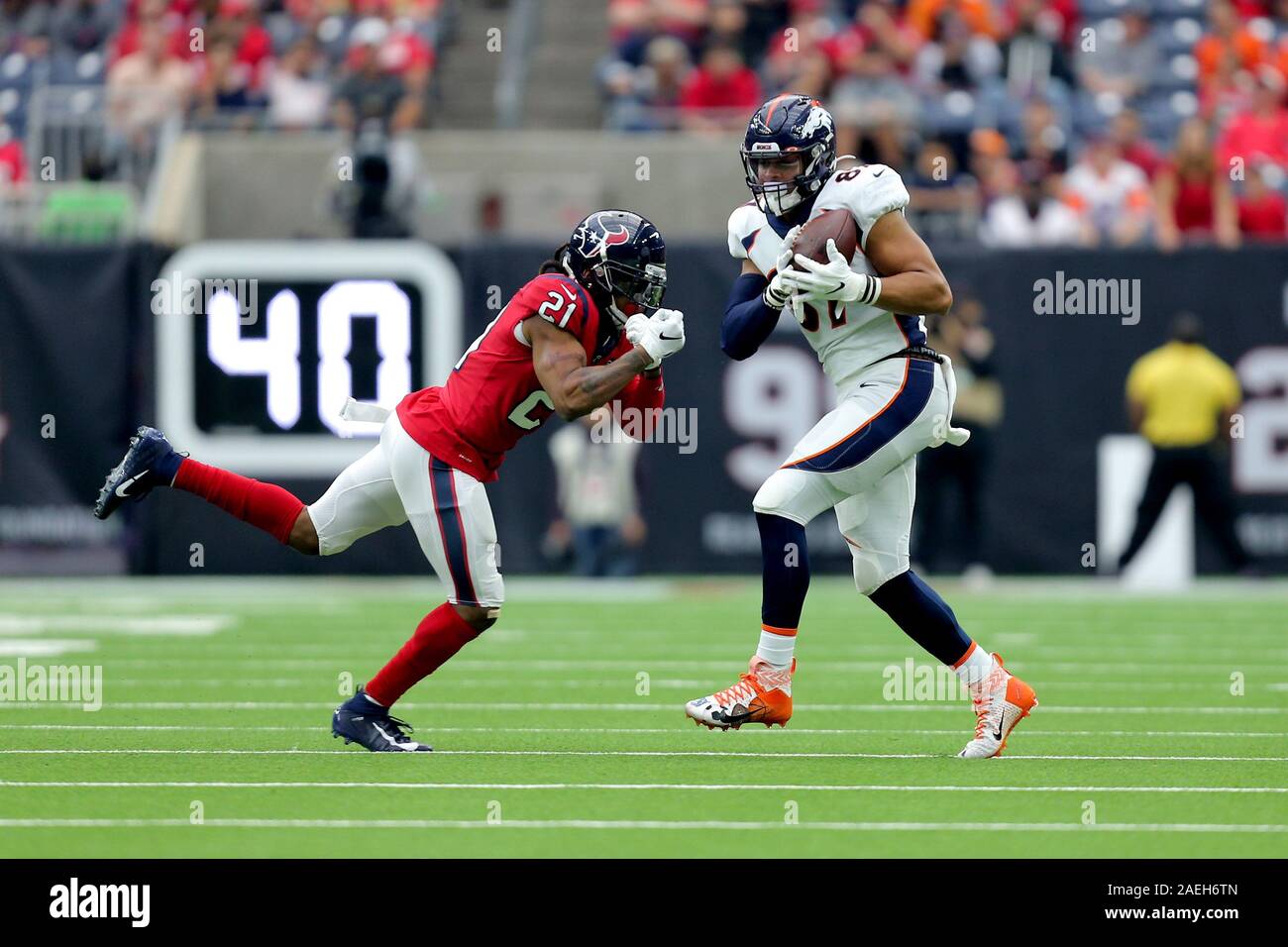 December 8, 2019, Houston, Texas, U.S: Denver Broncos tight end Noah Fant (87) makes a catch while Houston Texans cornerback Bradley Roby (21) defends during the NFL regular season game between the Houston Texans and the Denver Broncos at NRG Stadium in Houston, TX on December 8, 2019. (Credit Image: © Erik Williams/ZUMA Wire) Stock Photo