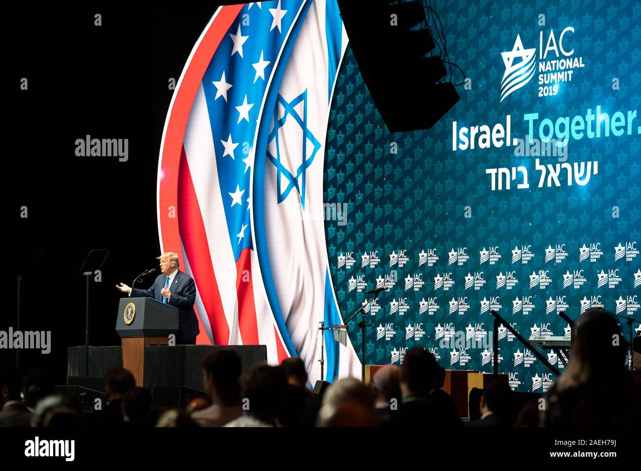 U.S President Donald Trump addresses the Israeli American Council National Summit at the Diplomat Beach Resort December 7, 2019 in Hollywood, Florida. Stock Photo