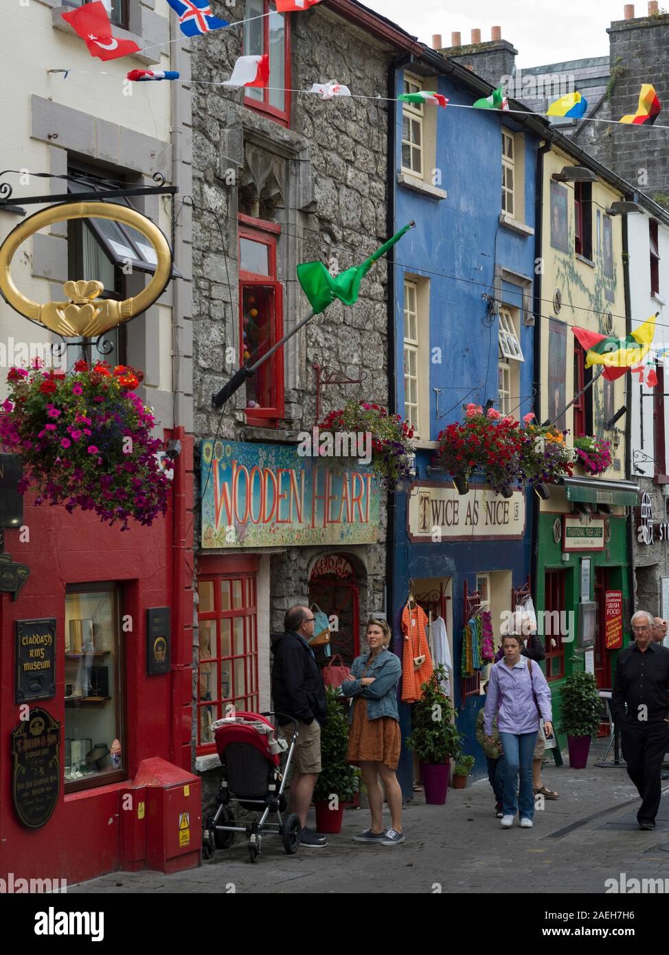 View of street with pedestrian and stores, Galway City, County Galway, Ireland Stock Photo