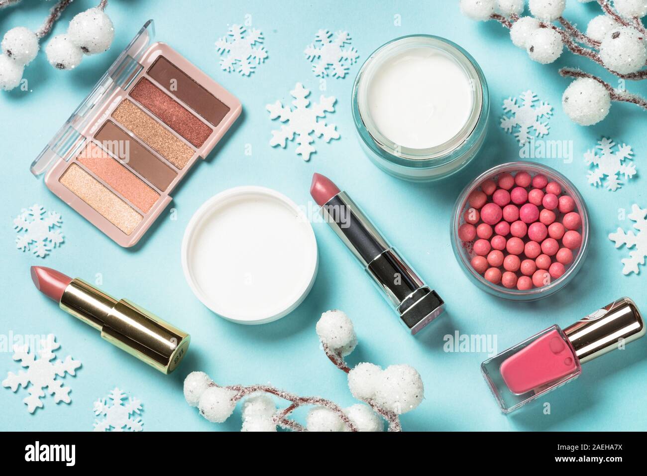 Makeup products, skincare product with christmas decorations. Stock Photo