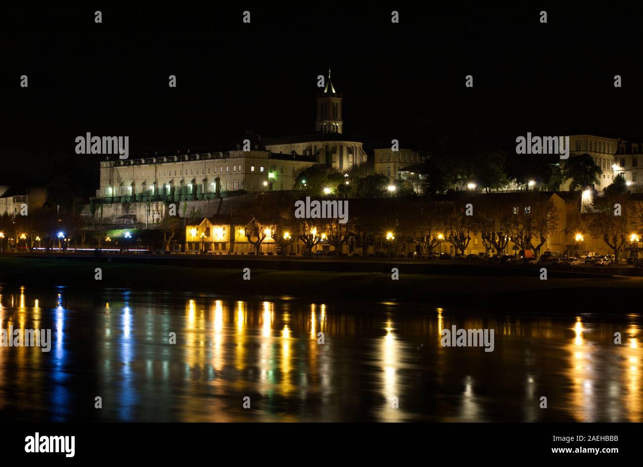 La Réole waterfront on the Garonne river at night, Gironde, Aquitaine, France Stock Photo
