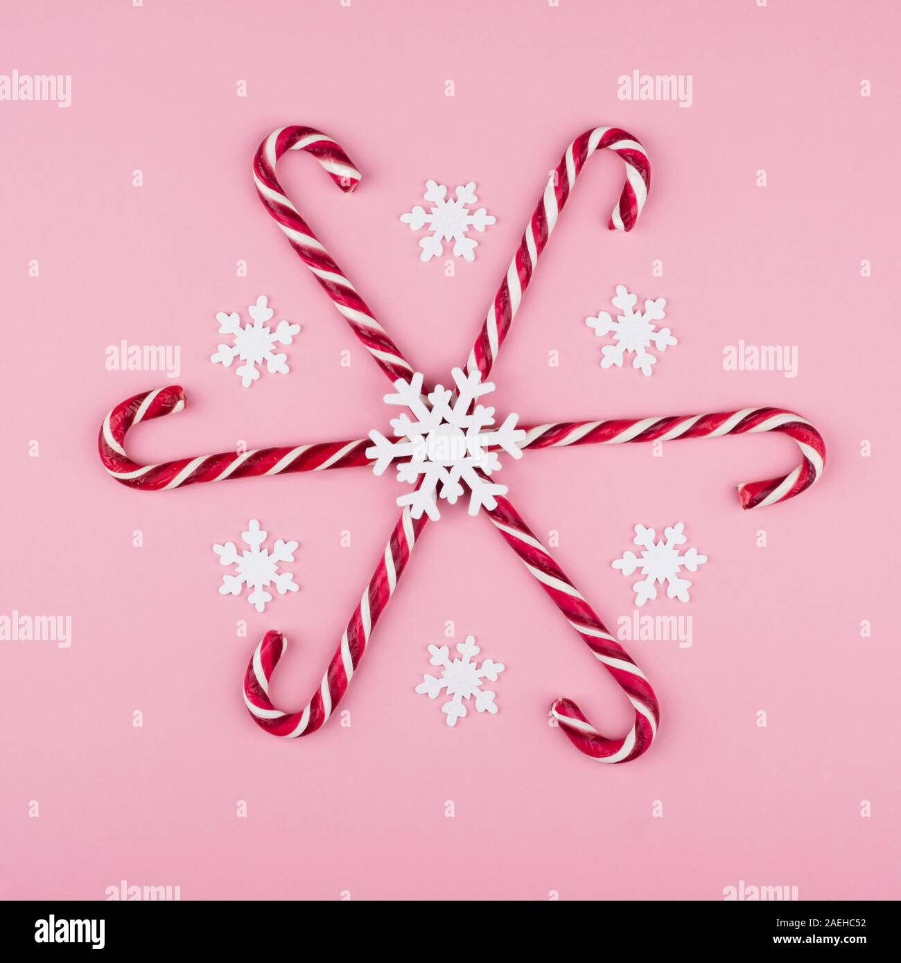 Christmas candy arrangement on a pink background Stock Photo