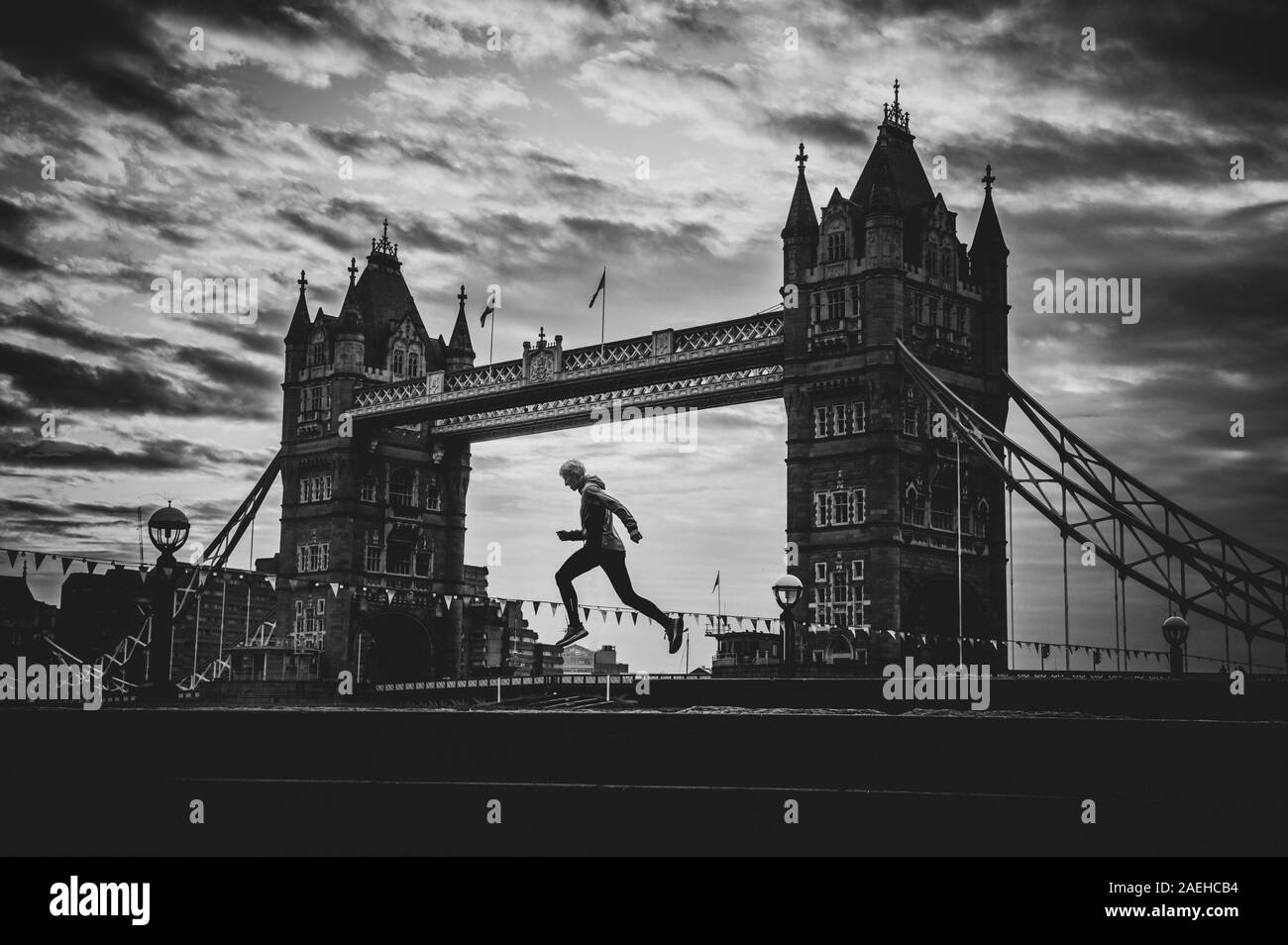 Silhouette of runner and Tower bridge in London. Concept photo for running competition in London as London marathon Stock Photo