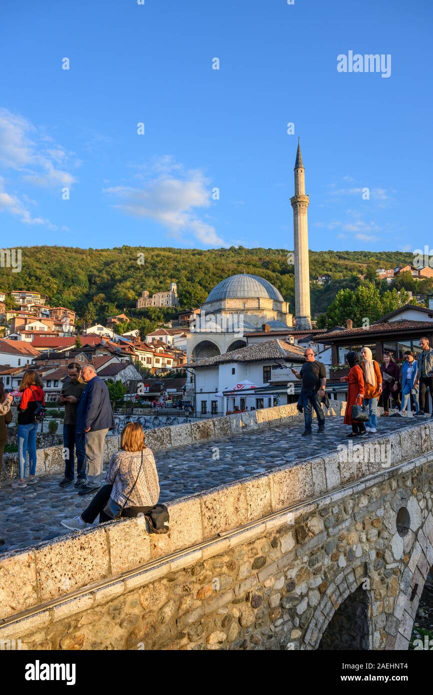 Looking across to The old town of Prizren and The Sinan Pasha Mosque from the stone bridge across the Bistrica river. in Kosovo, central Balkans. Stock Photo