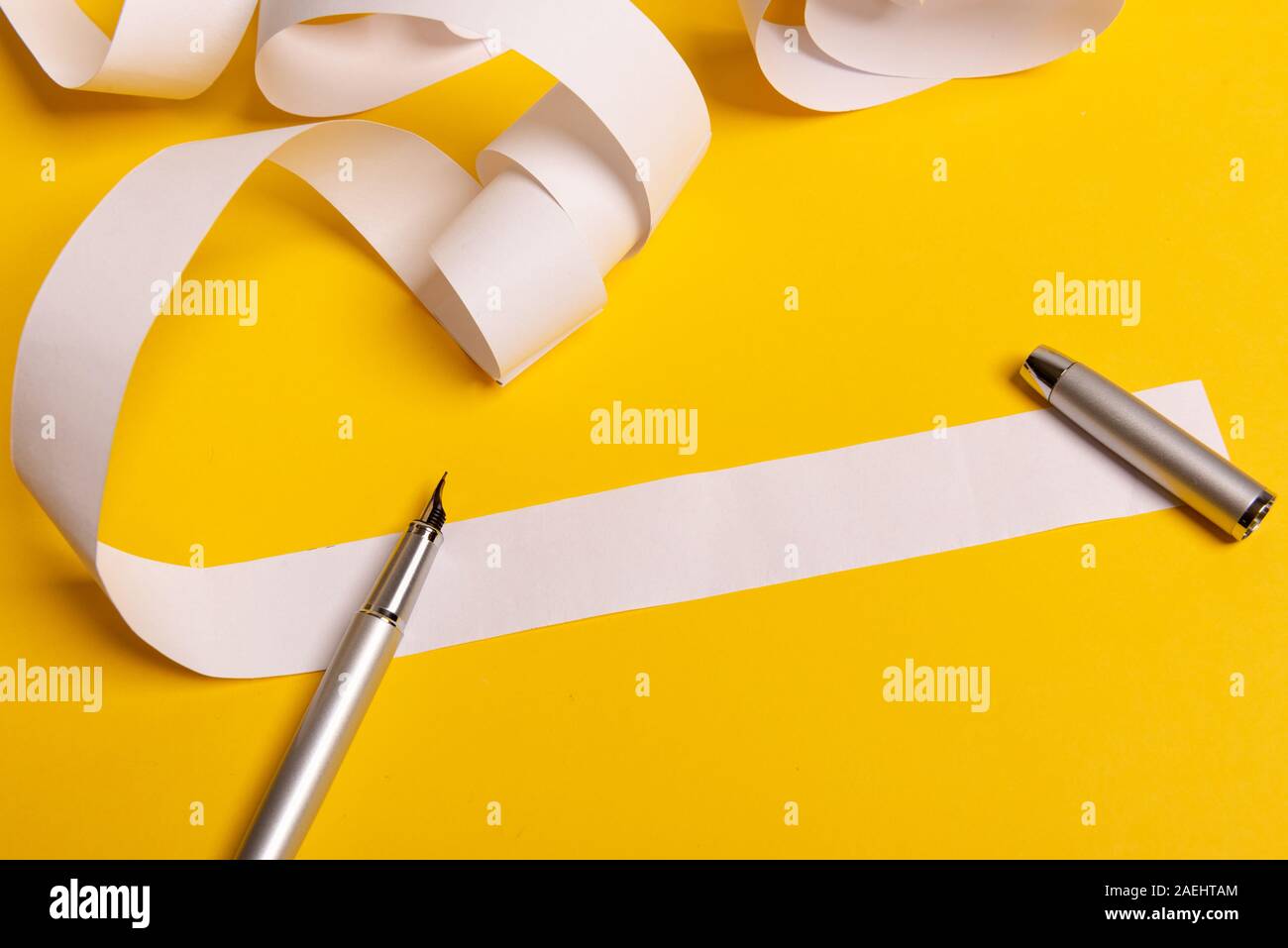 Long twisted expanded empty letter. Copy space. yellow background. View ...