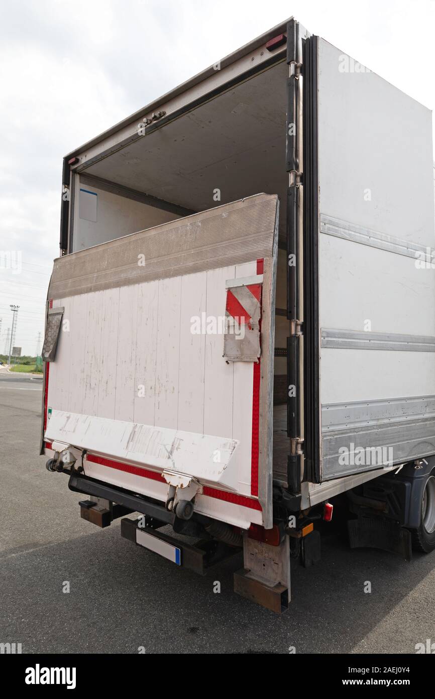 Loading Lift Ramp at Cargo Truck Transport Stock Photo - Alamy
