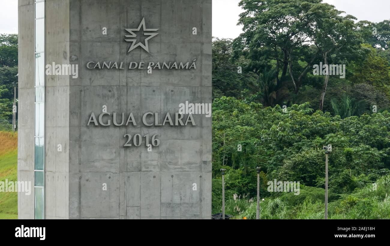 Closeup of Agua Clara control tower (torre de control). New locks of Panama with forest as a backgr Stock Photo