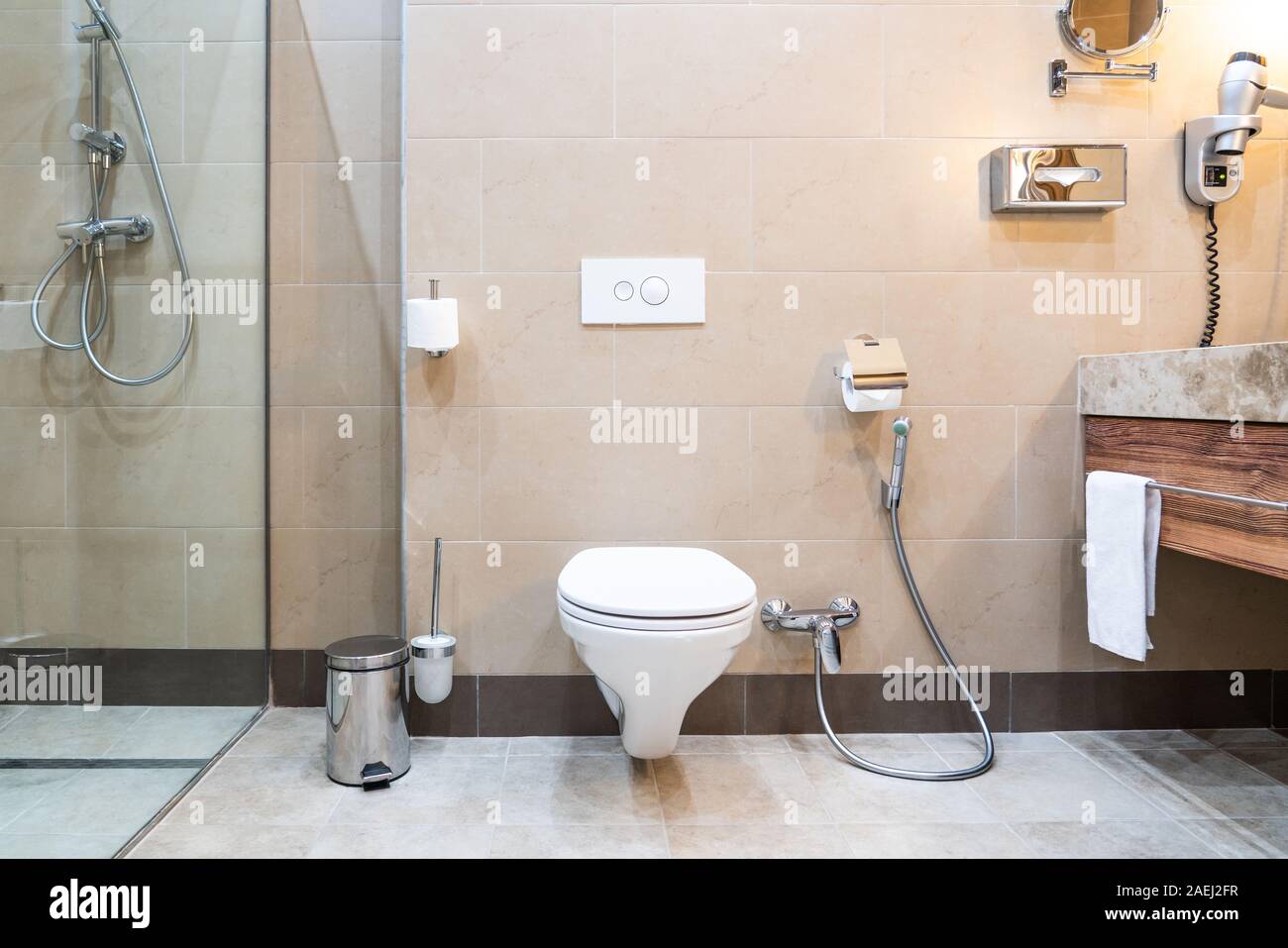 White toilet bowl in a modern bathroom Stock Photo - Alamy