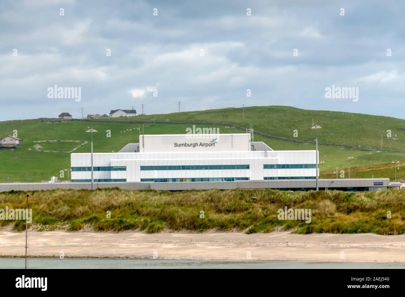 Sumburgh Airport in the south of Shetland Mainland, seen across West Voe beach. Stock Photo