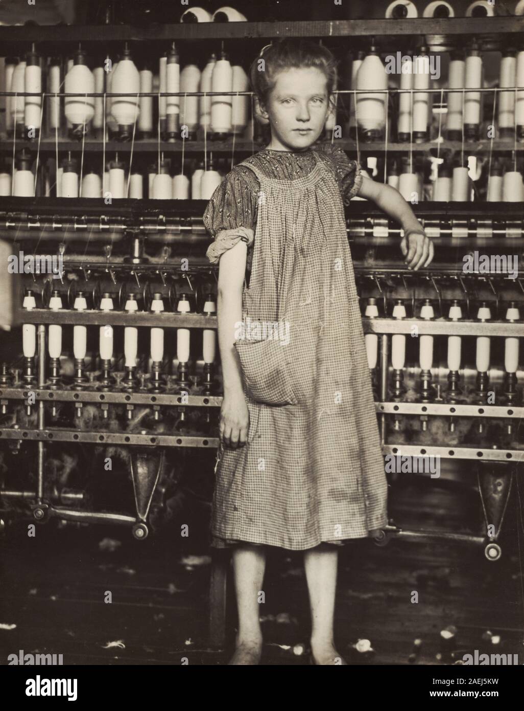 Lewis Hine, Addie Card, 12 years old Spinner in cotton mill, North Pownal, Vermont, 1910 Addie Card, 12 years old. Spinner in cotton mill, North Pownal, Vermont; 1910date Stock Photo