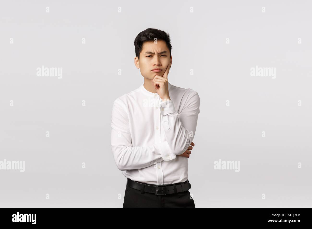 Pensive asian korean business man hi-res stock photography and images ...