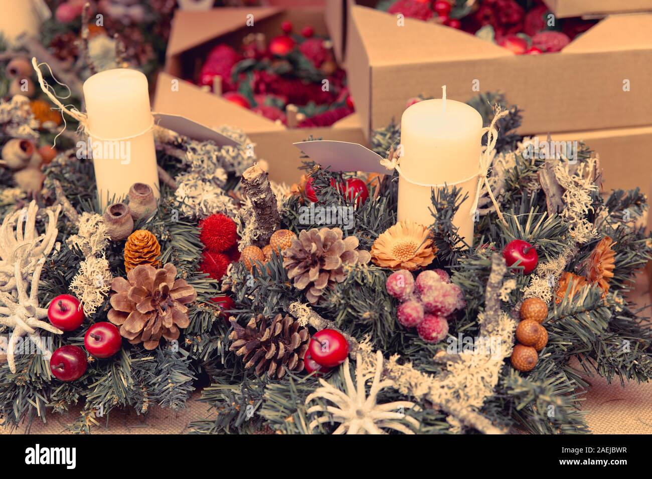 warm background with Christmas decorations and extinguished candles Stock Photo