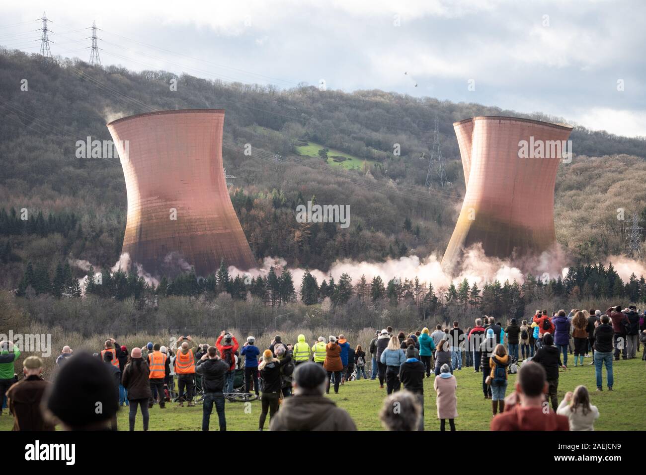 Ironbridge, Shropshire, UK. 6th December 2019. Explosives are used to demolish four cooling towers of the decommissioned Ironbridge Power Station near Stock Photo