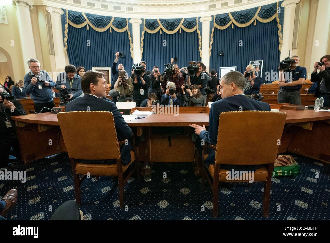 Washington, United States. 09th Dec, 2019. Dianiel Goldman (L), majority counsel, and Stephen Castor, minority counsel, take their seats during a House Judiciary Committee impeachment hearing into President Donald Trump, on Capitol Hill in Washington, DC on Monday, December 9, 2019. Photo by Kevin Dietsch/UPI Credit: UPI/Alamy Live News Stock Photo