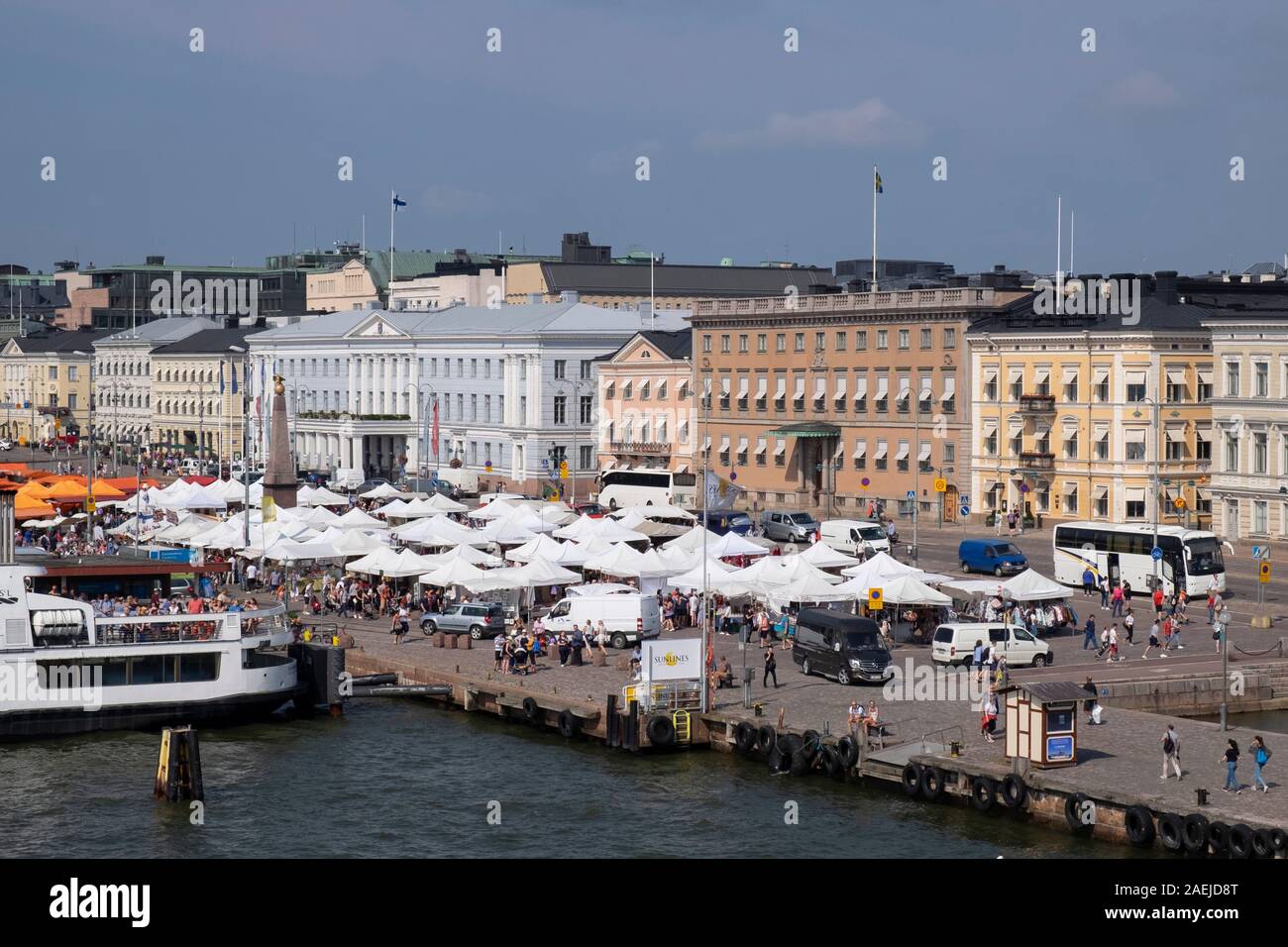 Elevated view across South Harbour  towards the outdoor market Kauppatori in Market Square and Government buildings,light grey building is the Town in Stock Photo