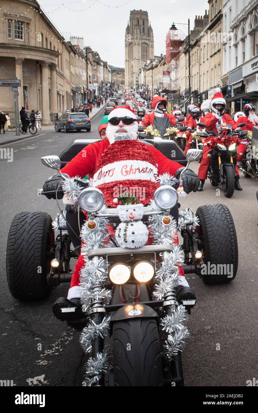 Park Street, Bristol, UK. 7th December 2019.  Hundreds of motorcyclists dressed as Santa, snowmen, elves and other Christmas characters ride down Park Stock Photo