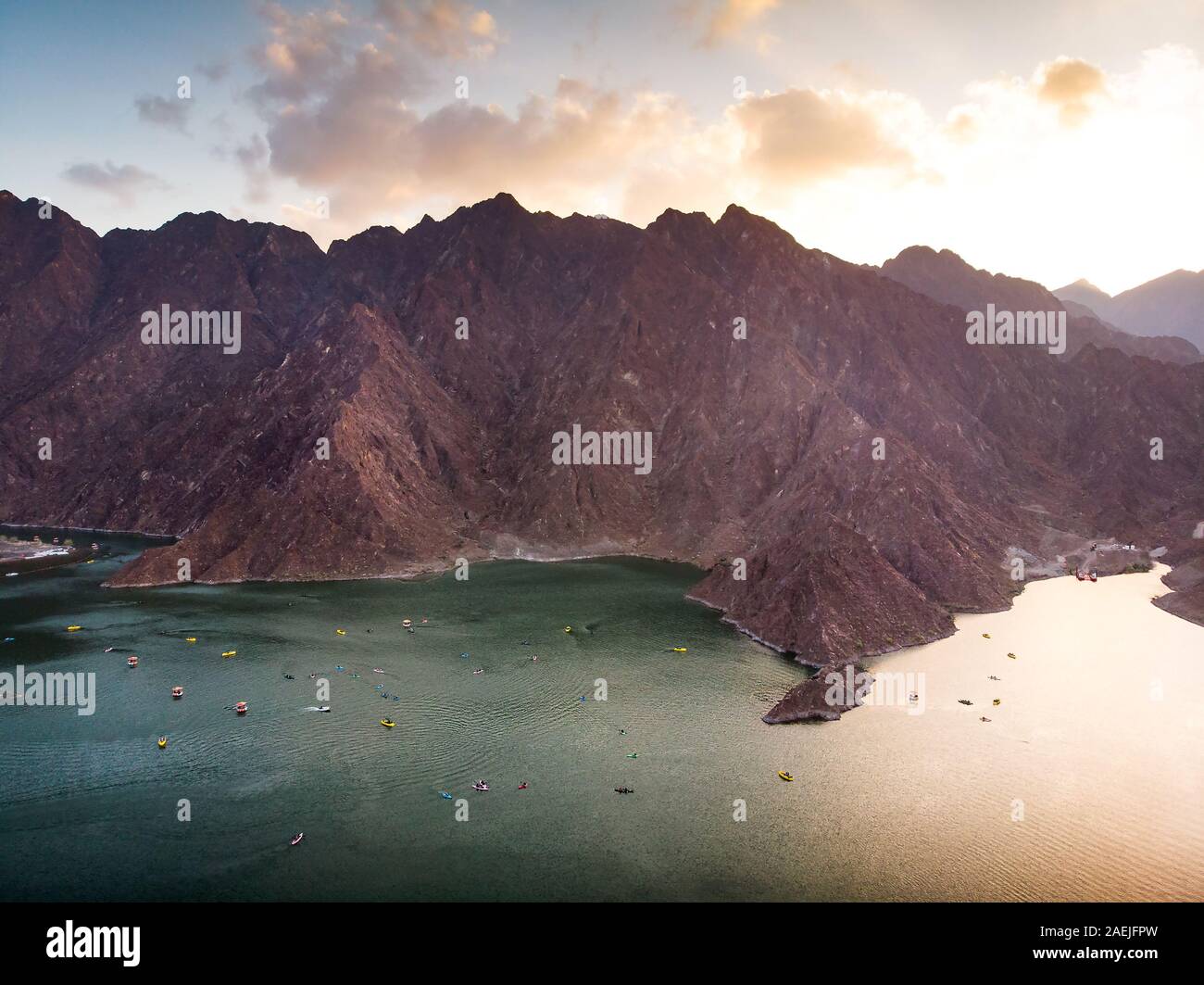 Hatta dam lake landscape in Dubai emirate of UAE at sunset Stock Photo