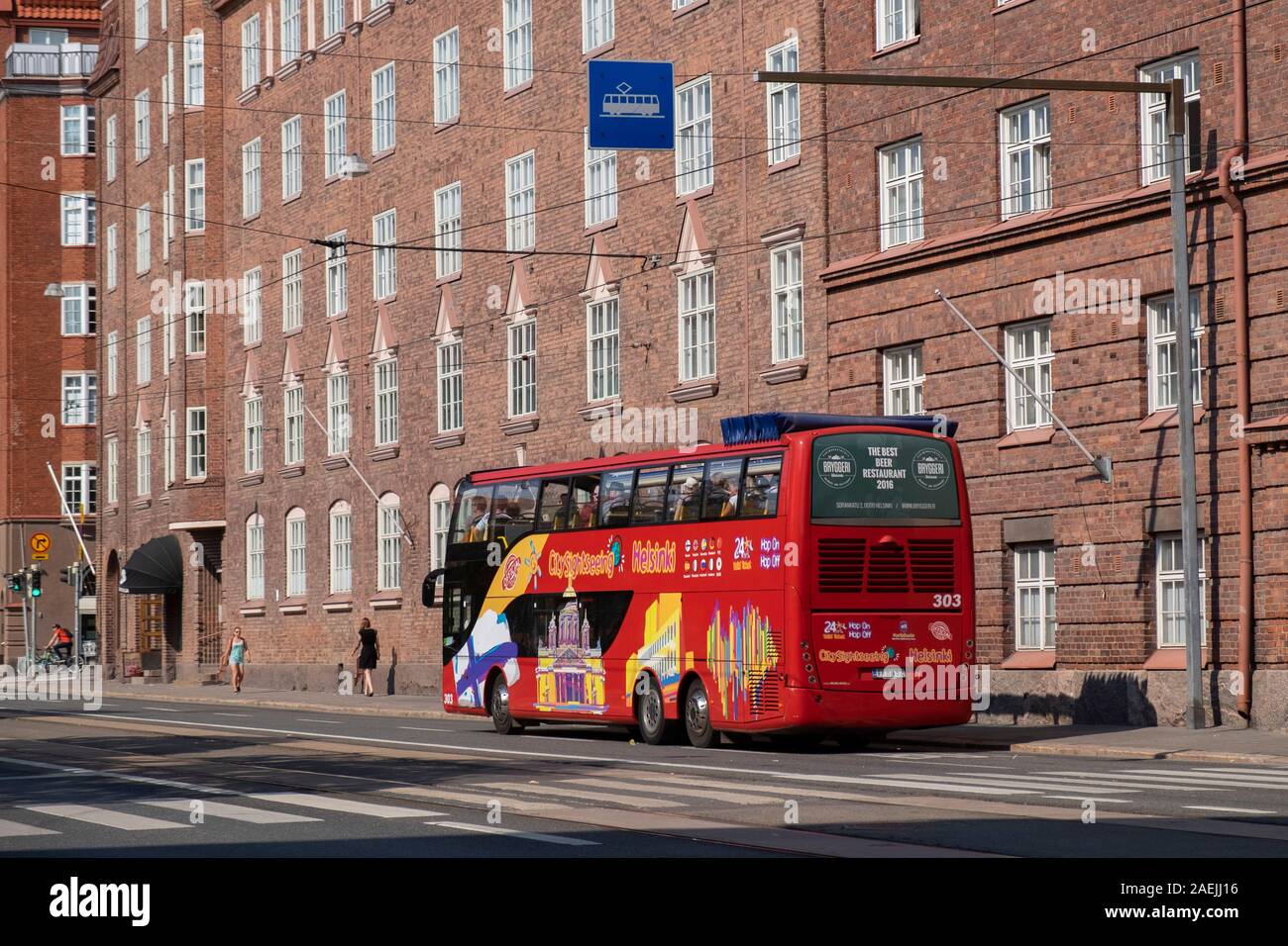 Hop-On Hop-Off sightseeing Bus  in Runeberginkatu Street, Helsinki, Finland,Scandinavia, Europe Stock Photo