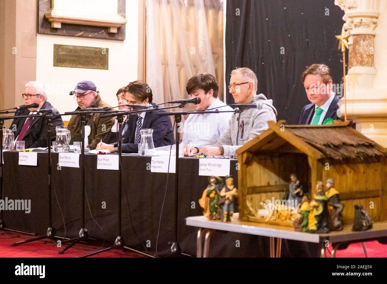 Cradley Heath, West Midlands, UK. 9th December, 2019. In the final few days of election campaigning, six parliamentary candidates hoping to represent Halesowen and Rowley Regis constuency have hustings in a parish church in the heart of the Black Country in the West Midlands. The hustings is held in the chancel of Holy Trinity (Church of England) with the public occupying the pews, and was organised by Richard Hackett, the church's curate, and chaired by the vicar Reverend Nick Gowers. Credit: Peter Lopeman/Alamy Live News Stock Photo
