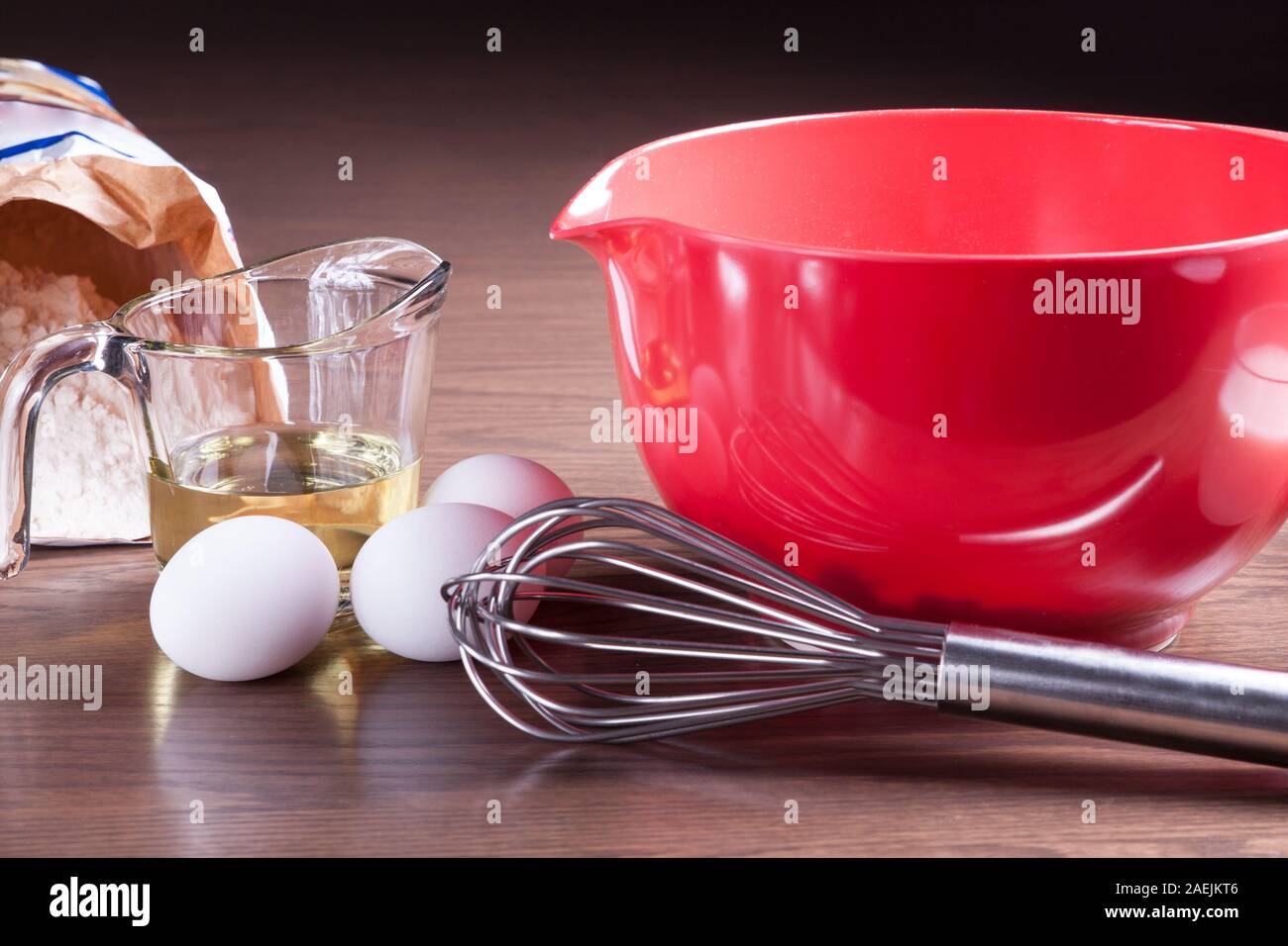 https://c8.alamy.com/comp/2AEJKT6/closeup-on-ingredients-and-tools-to-cook-a-homemade-cake-from-scratch-2AEJKT6.jpg