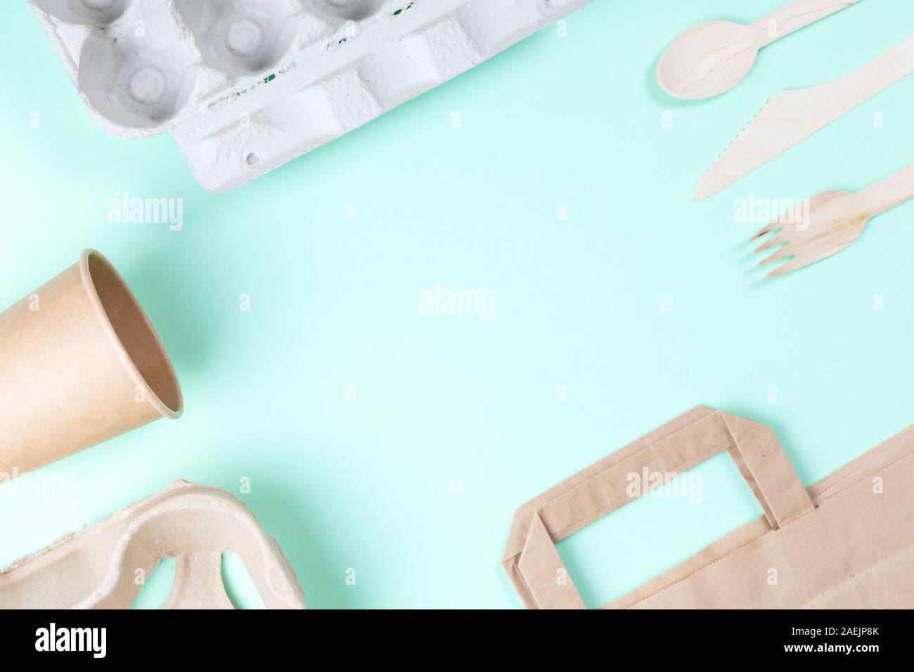 Sustainable eco friendly concept. Kitchenware on a teal background