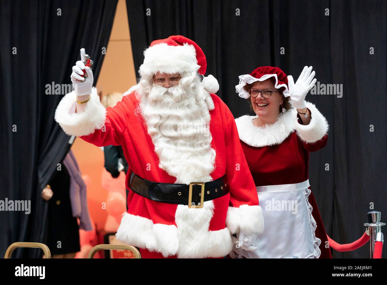 Santa and Mrs. Claus wave as U.S First Lady Melania Trump arrives to