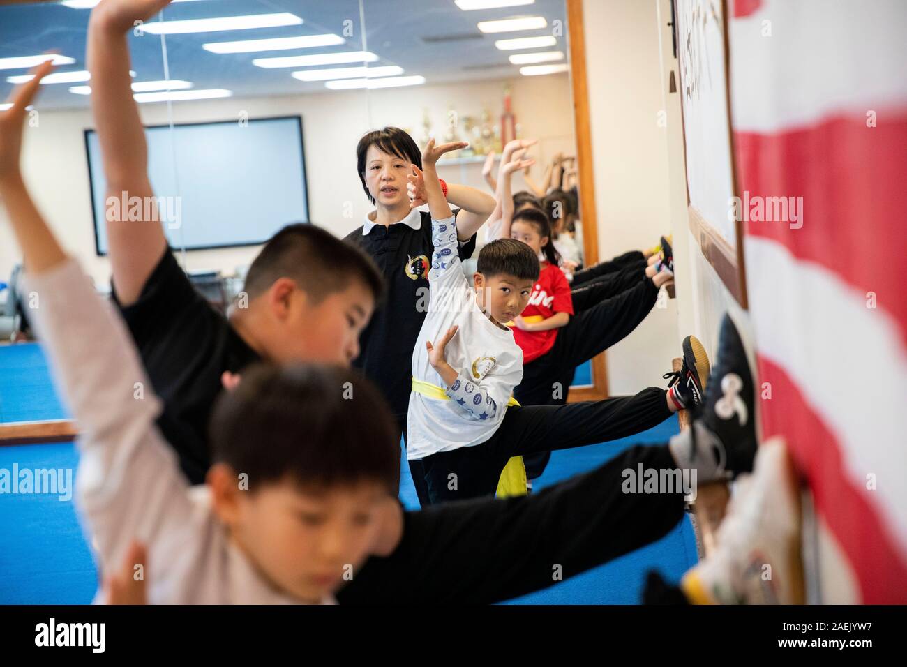New York, USA. 20th Nov, 2019. Lin Xu (rear), wife of Chen Sitan