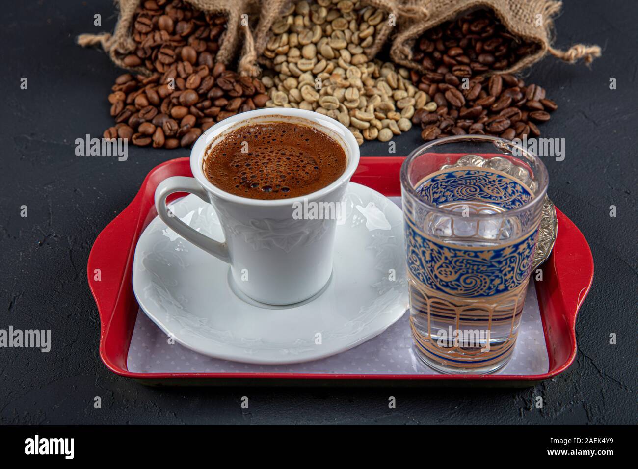Traditional turkish coffee drink concept. Turkish coffee with glass of