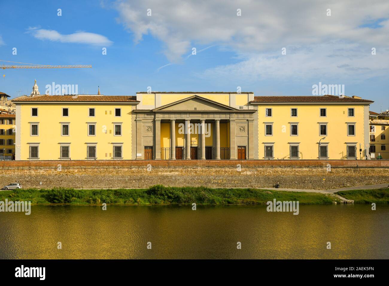 The neoclassical façade of the Chamber of Commerce overlooking the Arno River on Lungarno Generale Diaz in the centre of Florence, Tuscany, Italy Stock Photo