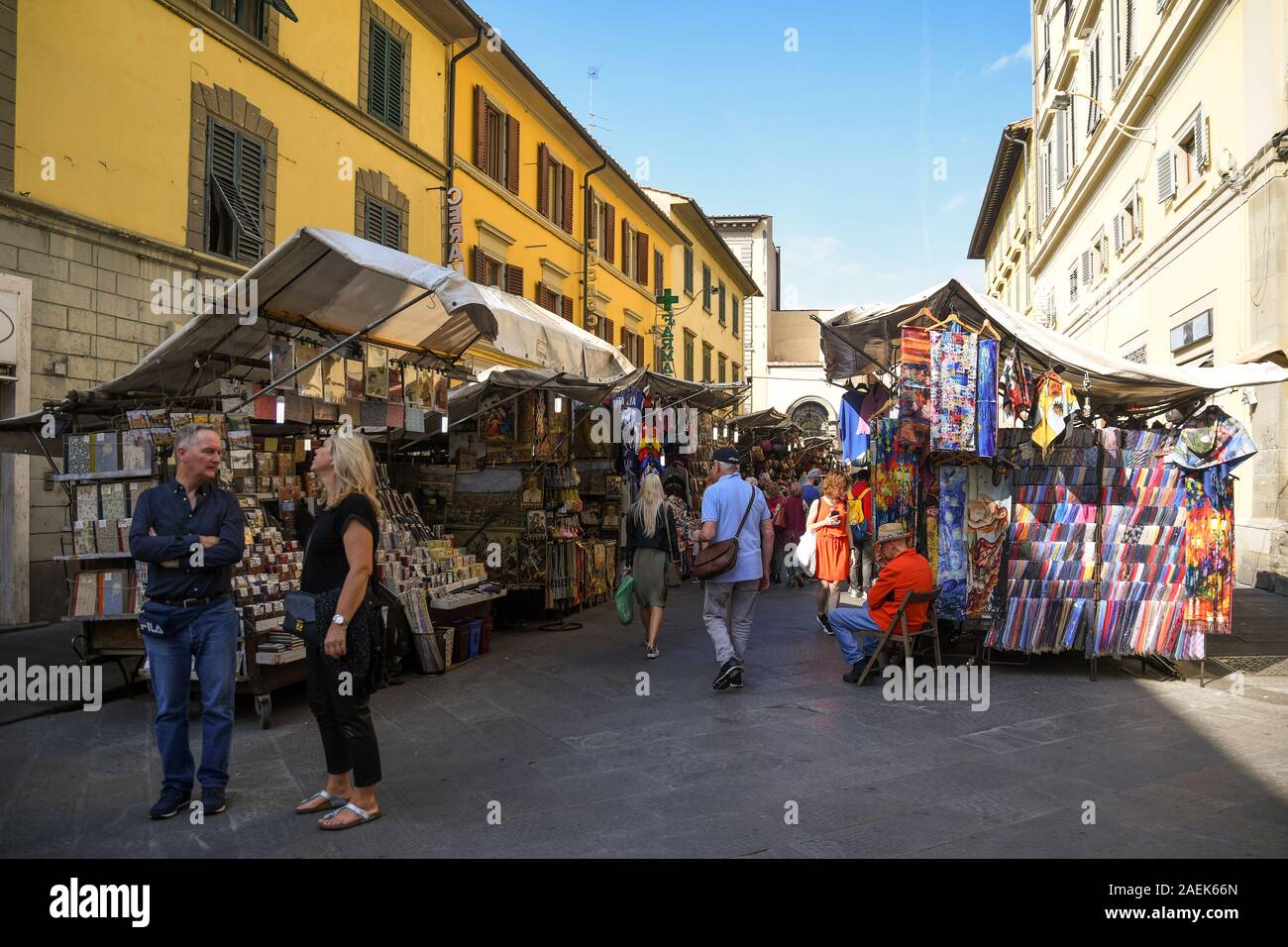 View of the San Lorenzo street market with stalls selling leather goods, silk ties and souvenirs in the historic centre of Florence, Tuscany, Italy Stock Photo