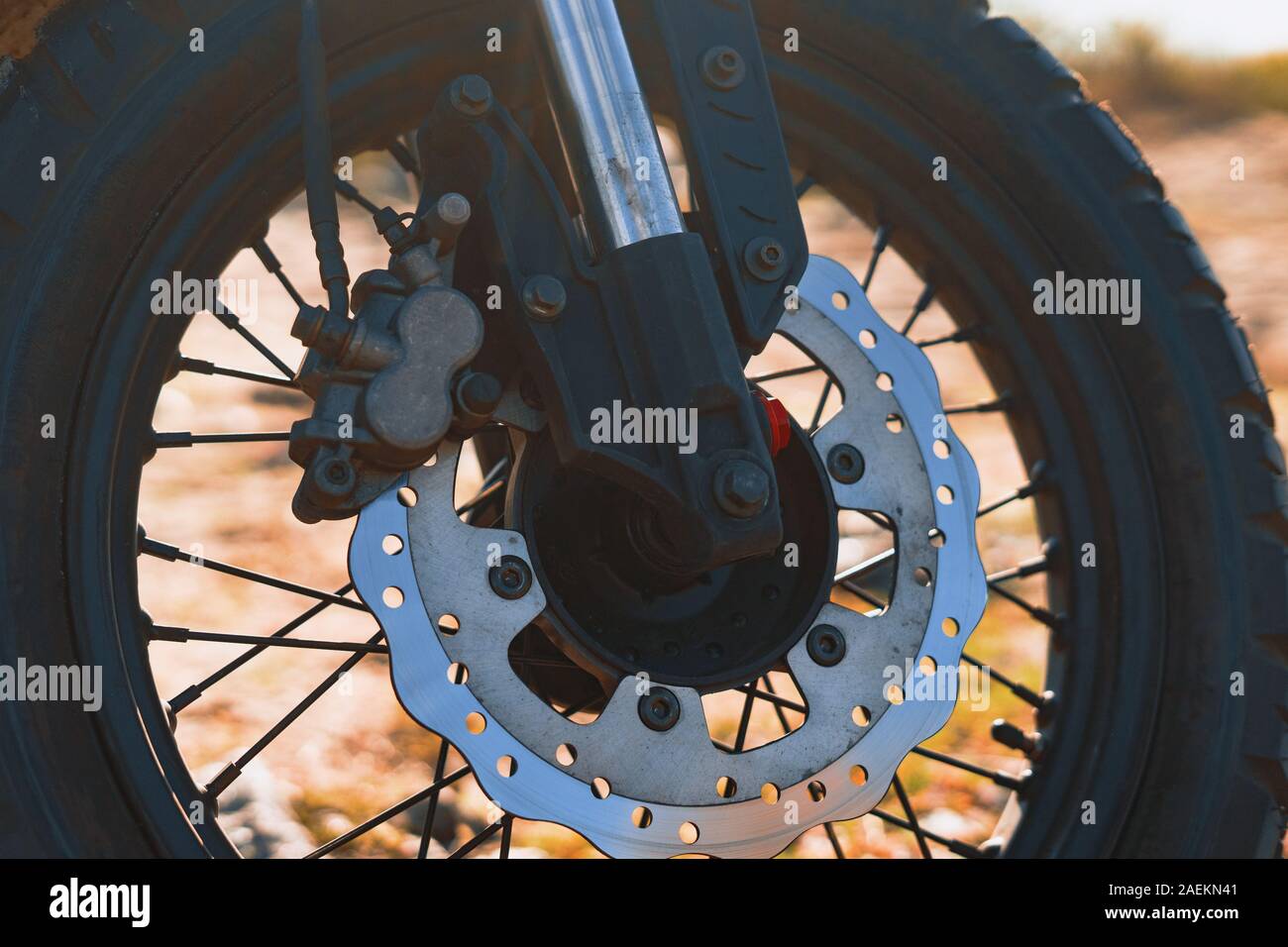 Old style spoked motorcycle wheel with disk brakes Stock Photo Alamy
