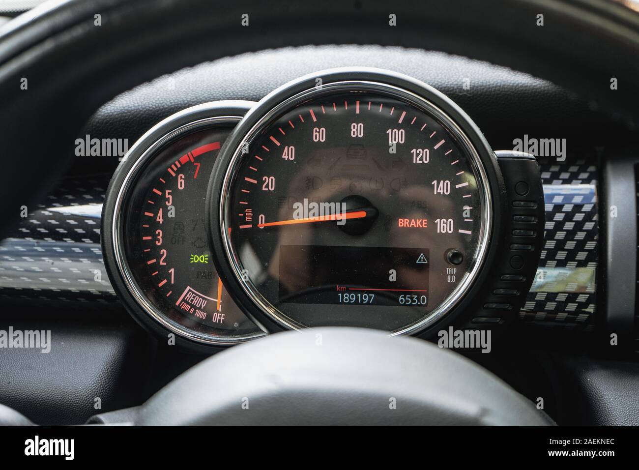 Modern car dashboard with speedometer, rpm meter and indicators Stock