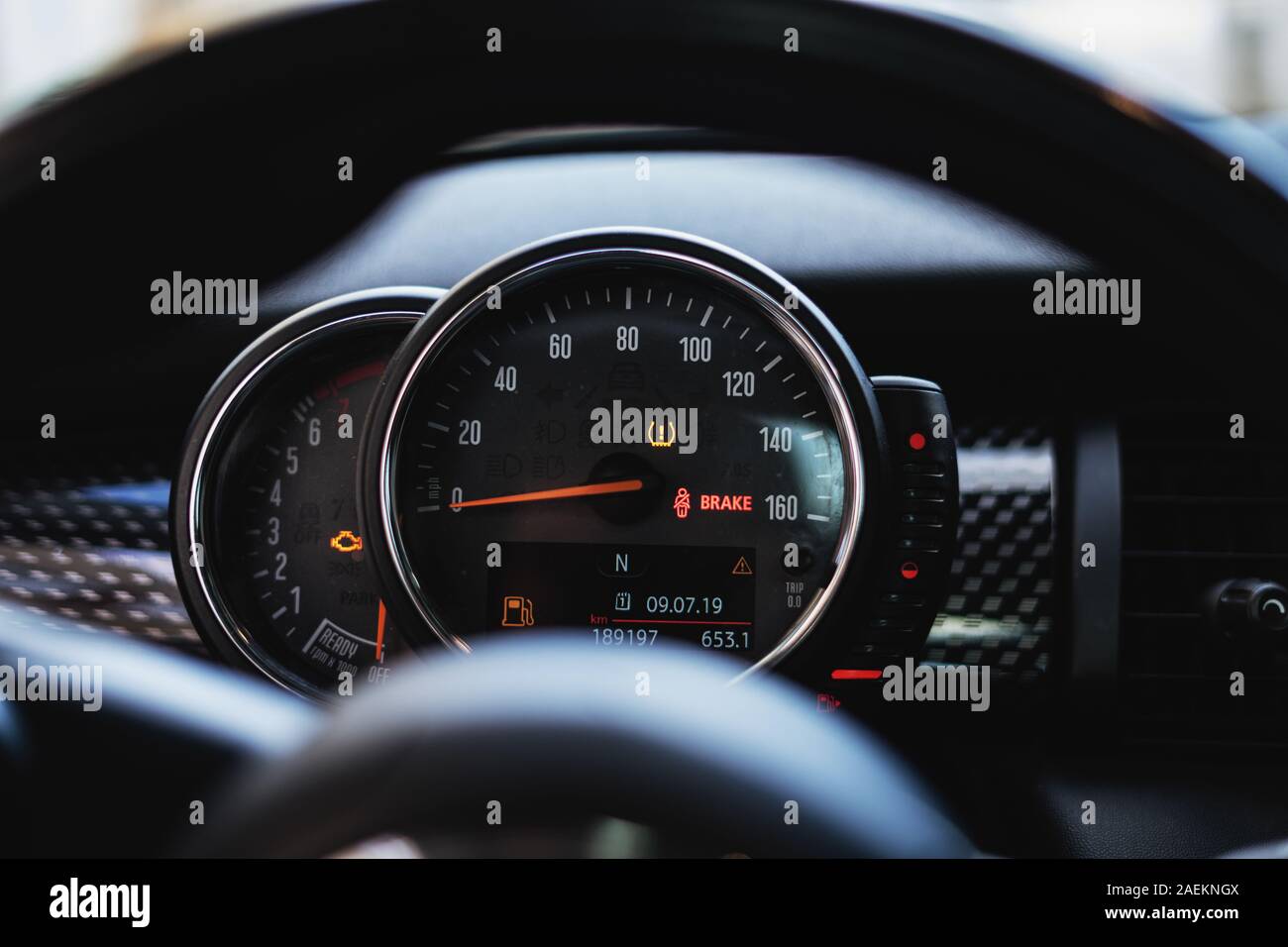 Modern car dashboard with speedometer, rpm meter and indicators Stock