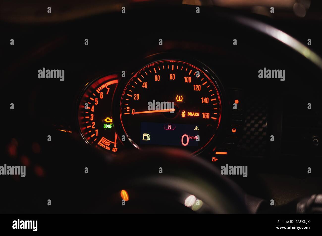 Modern car dashboard with speedometer, rpm meter and indicators Stock