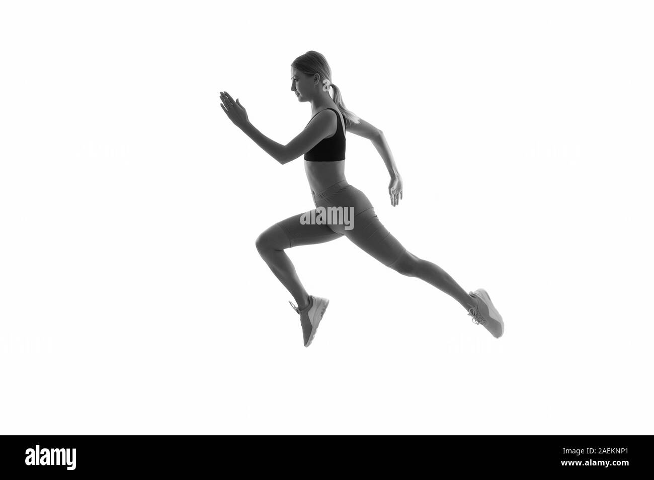 Girl runner on white background. Sport lifestyle and health concept. Start run. Life is motion. Woman athlete run achieve great result. How run faster. Speed training guide. Improve run speed. Stock Photo
