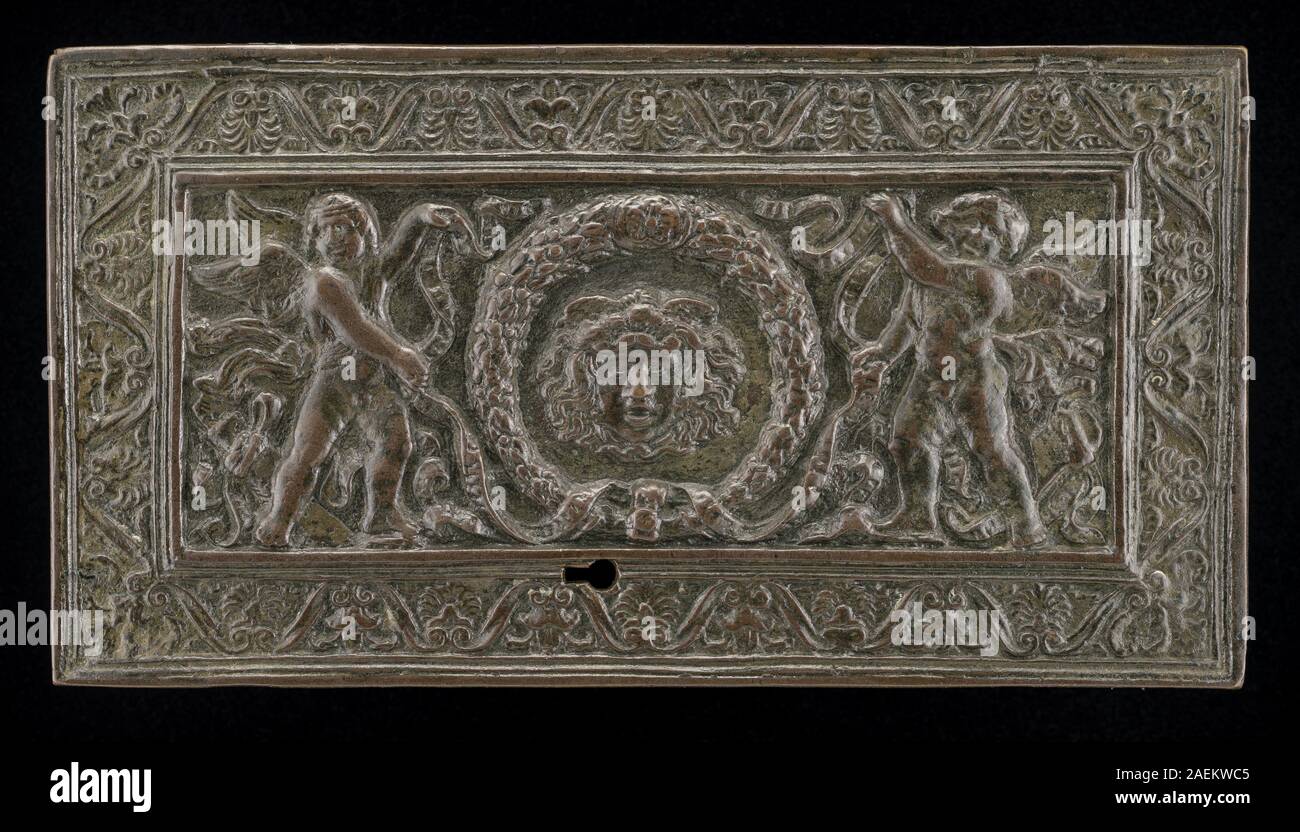 Paduan 15th Century, Cover of a writing casket- Geniuses with Wreath and Medusa Head, c 1500 Cover of a writing casket: Geniuses with Wreath and Medusa Head; circa 1500 date Stock Photo