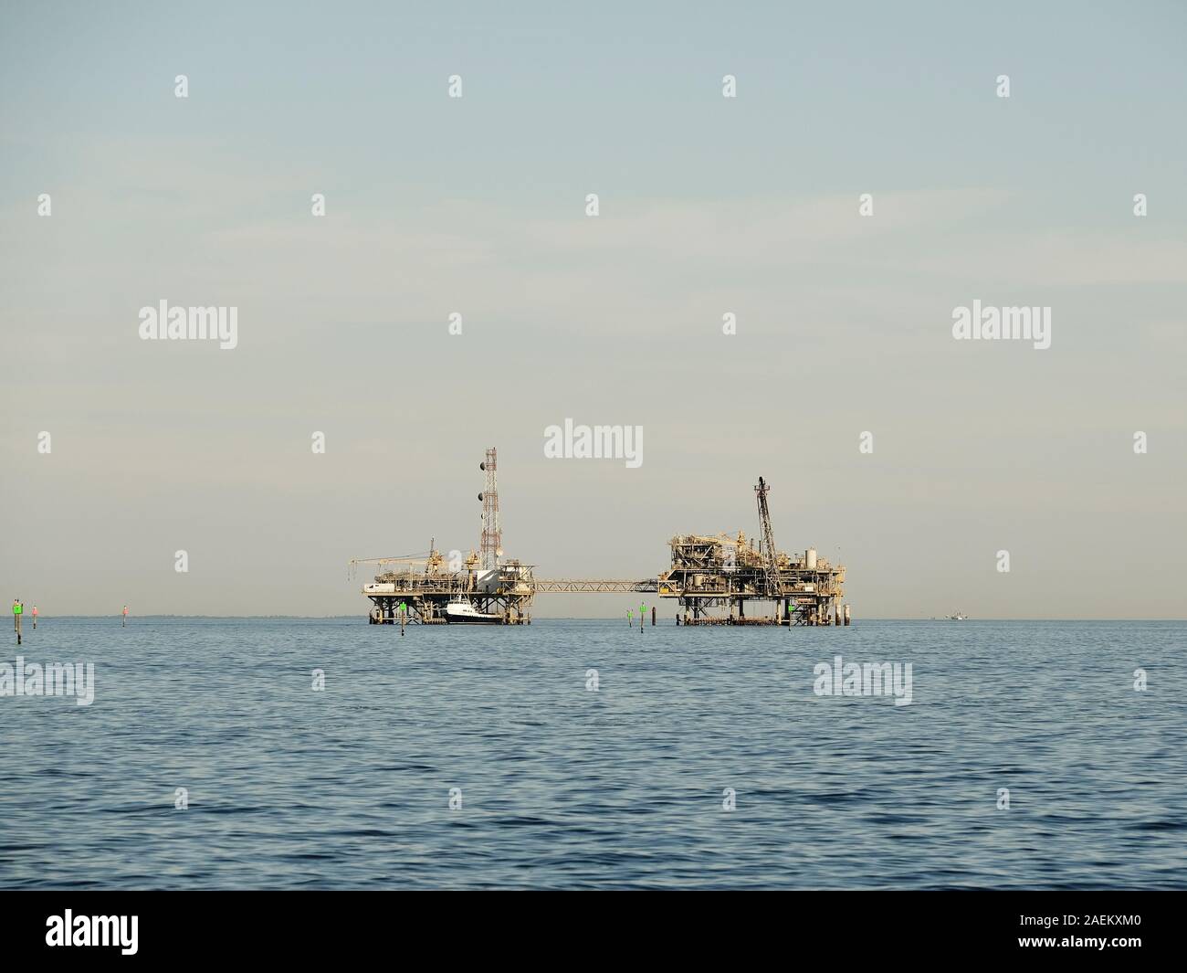 Offshore oil and gas drilling platform or rig in the Gulf of Mexico off the coast of Alabama, USA. Stock Photo