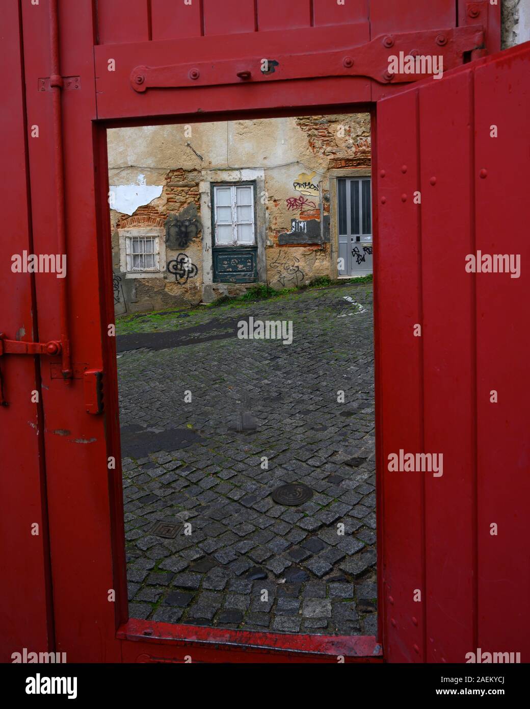 Cobblestone Road Seen From Open Door Alfama Sao Miguel Lisbon