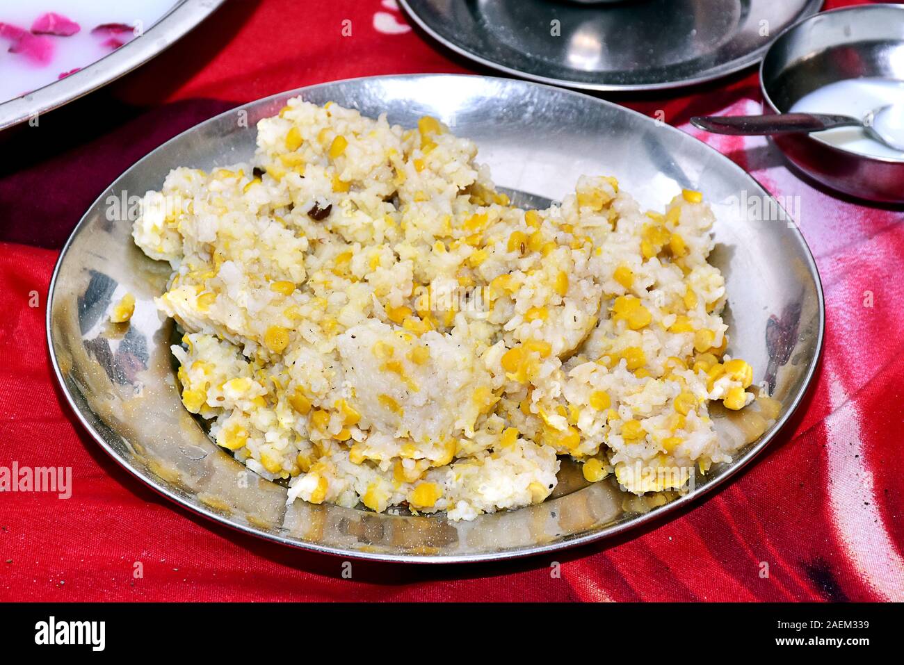 Indian Food Khichdi with rice and mung bean on a plate closeup