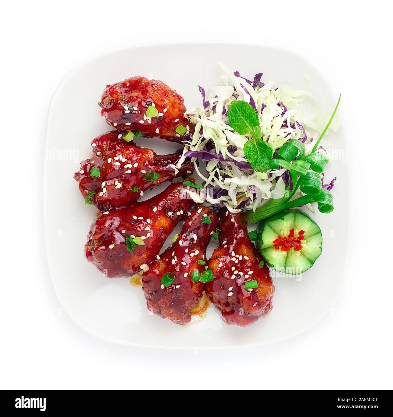 Spicy Korean Fried Chicken Bonchon Sauce Korean Style Topped Ssesame And Spring Onions Decorate With Carved Cucumber And Slice Cabbage Style Topview Stock Photo Alamy