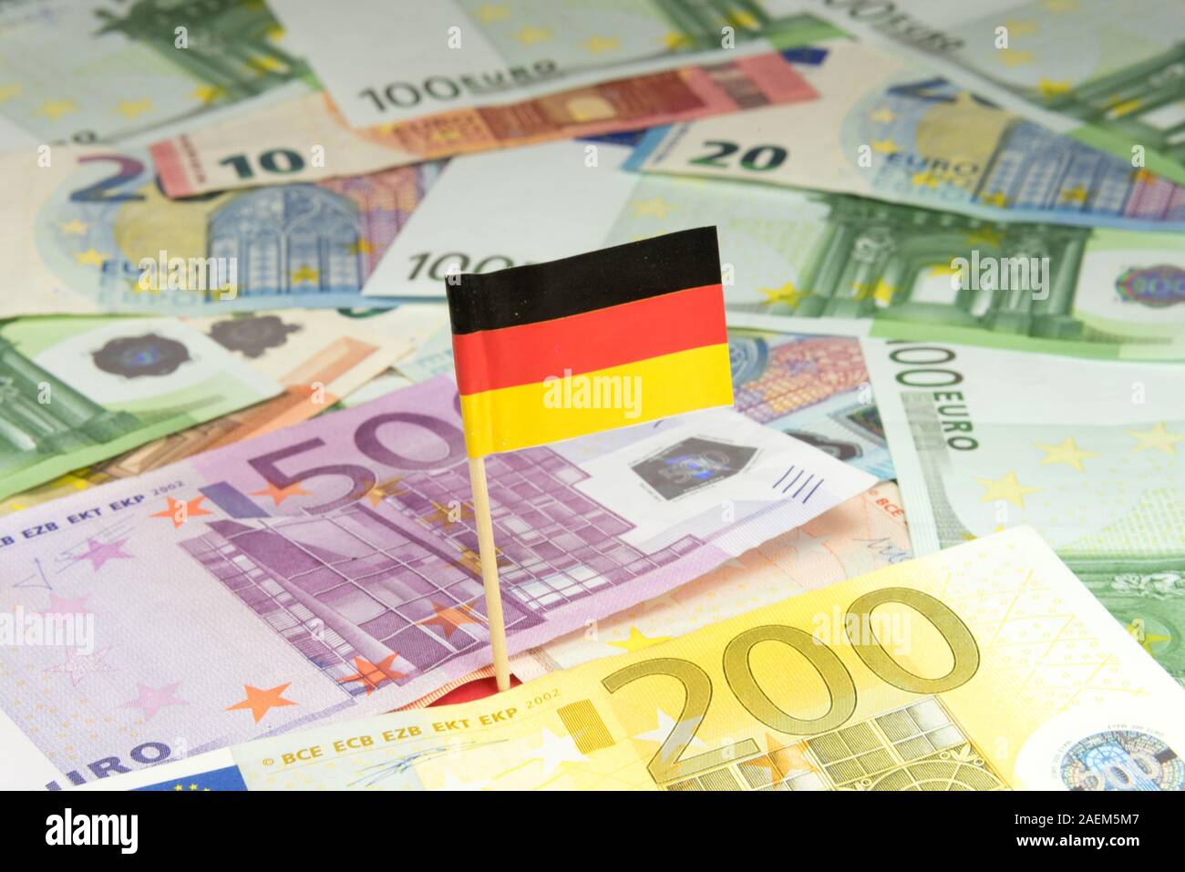 Euro bills and flag of Germany Stock Photo