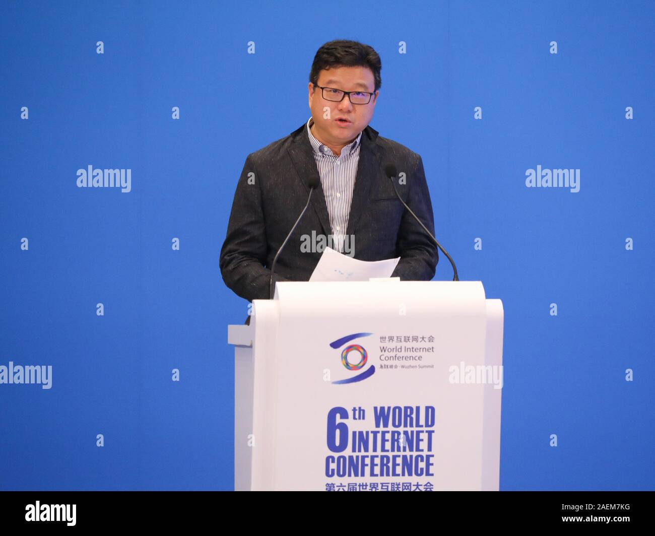 --FILE--Chinese billionaire businessman, William Lei Ding, founder and CEO of NetEase (163.com), delivers a speech at the 6th World Internet Conferenc Stock Photo