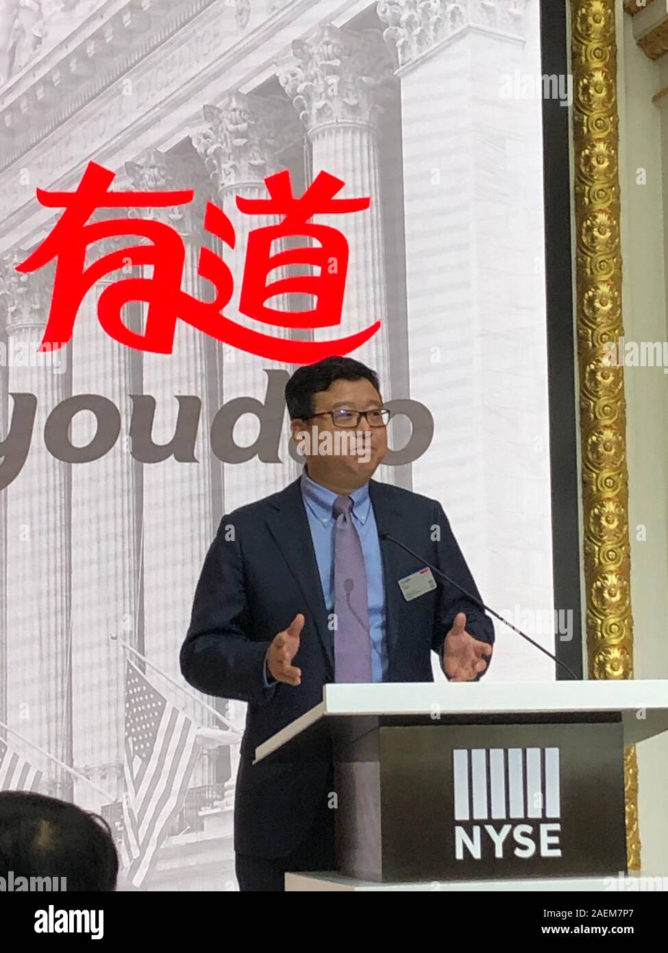 --FILE--Chinese billionaire businessman, William Lei Ding, founder and CEO of NetEase (163.com), speaks at the NetEase e-learning unit Youdao's Nasdaq Stock Photo