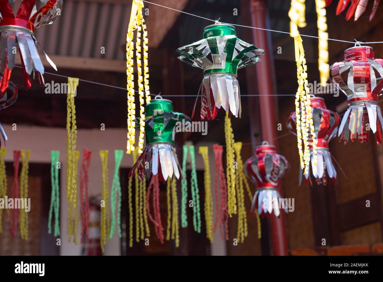 Improvised Christmas lantern decoration made out of recycled empty soft drinks cans. December 2019,Coron,Philippines Stock Photo